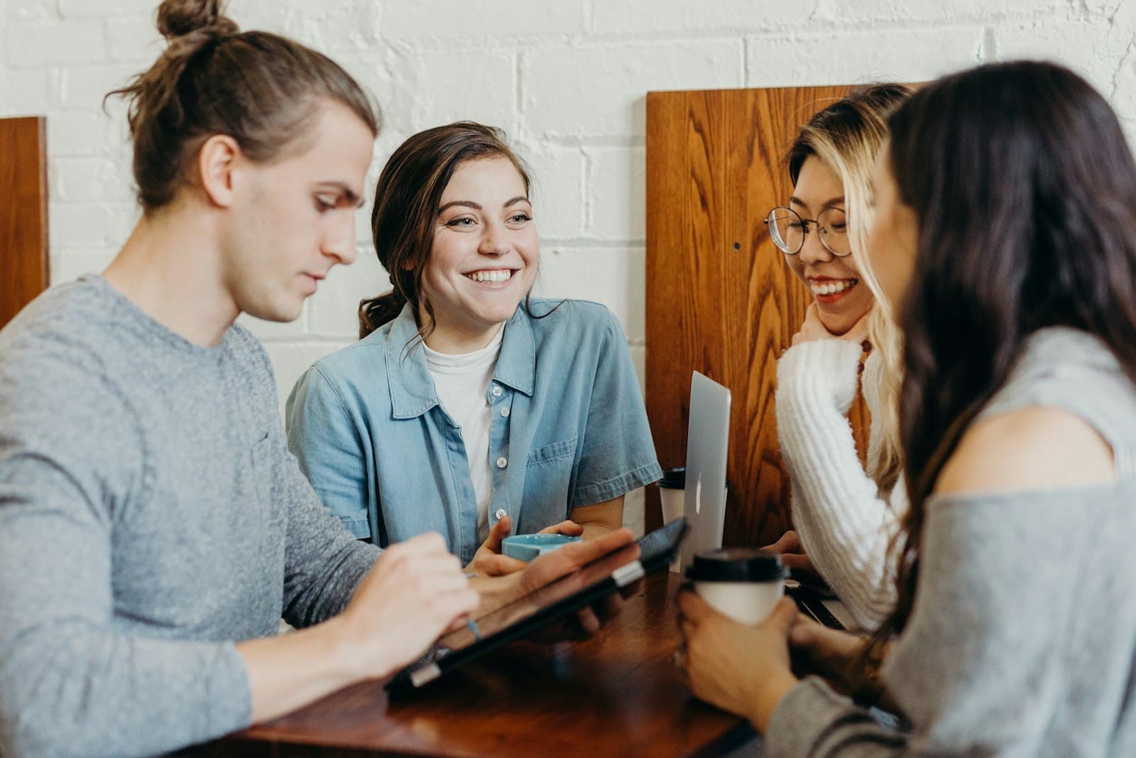 Students learning together around a table